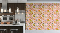 Illustrated veggie wallpaper brings character to a modern kitchen.