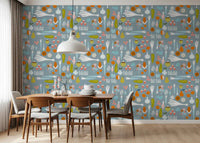 Colorful garden motifs on this dusty blue veggie wallpaper for dining area.