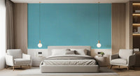 Soft turquoise mid century wallpaper adds a gentle touch to a sunlit bedroom.