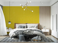 Mustard Linen Texture Wallpaper creates a warm backdrop for bedroom.