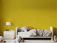 Bedroom walls displaying the Mustard Linen Mid Century Modern Wallpaper.