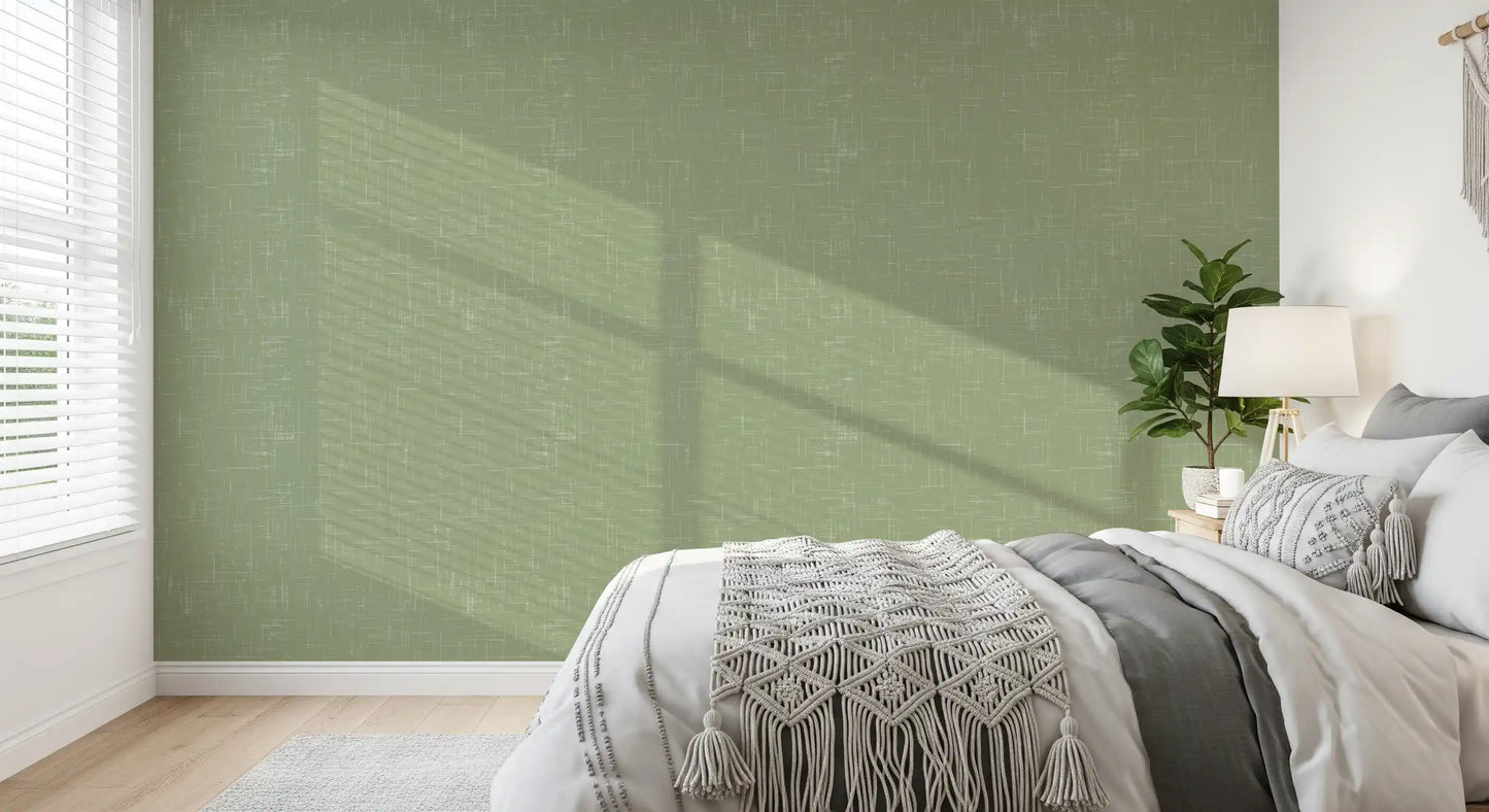 Delicate crosshatching defines this sage green linen texture wallpaper.