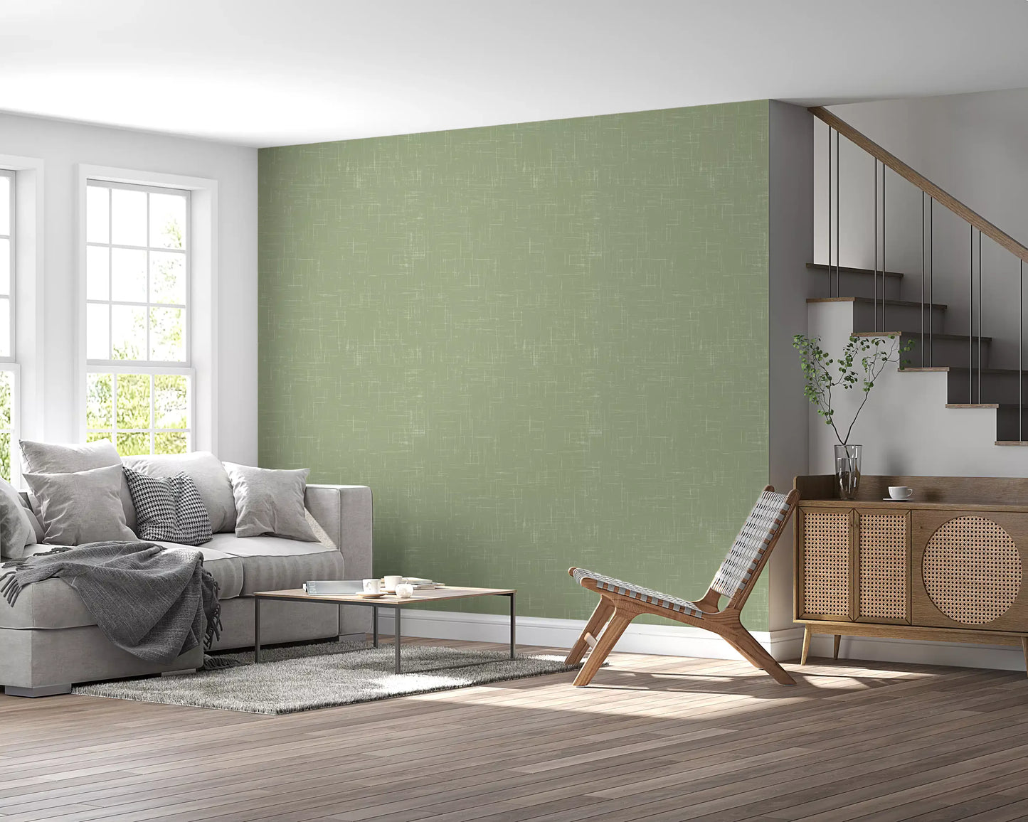Living room walls feature the calming sage green linen texture wallpaper.
