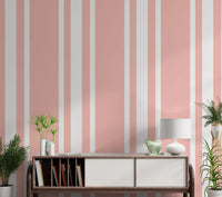 A classic pink ticking wallpaper lines the welcoming hallway walls., GD9958