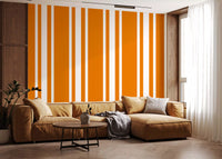 Playful striped wallpaper pattern inside a modern living room.