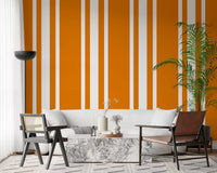 Vertical stripes on orange ticking stripe wallpaper.