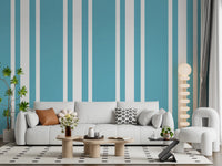 Blue Ticking Stripe Wallpaper lines the walls of a cozy seating space.