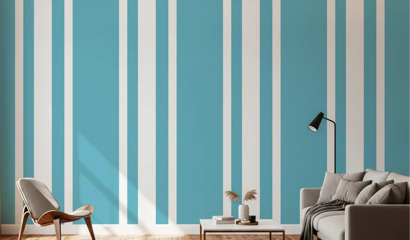 Retro blue wallpaper accentuates the walls of a light-filled living room.