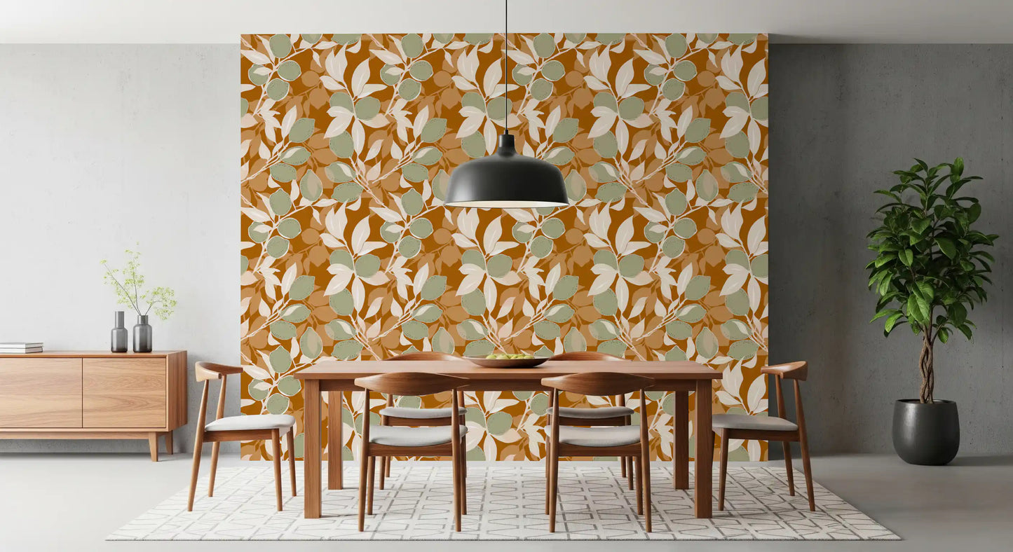 Overlapping leaf silhouettes on sage terracotta lemon wallpaper.
