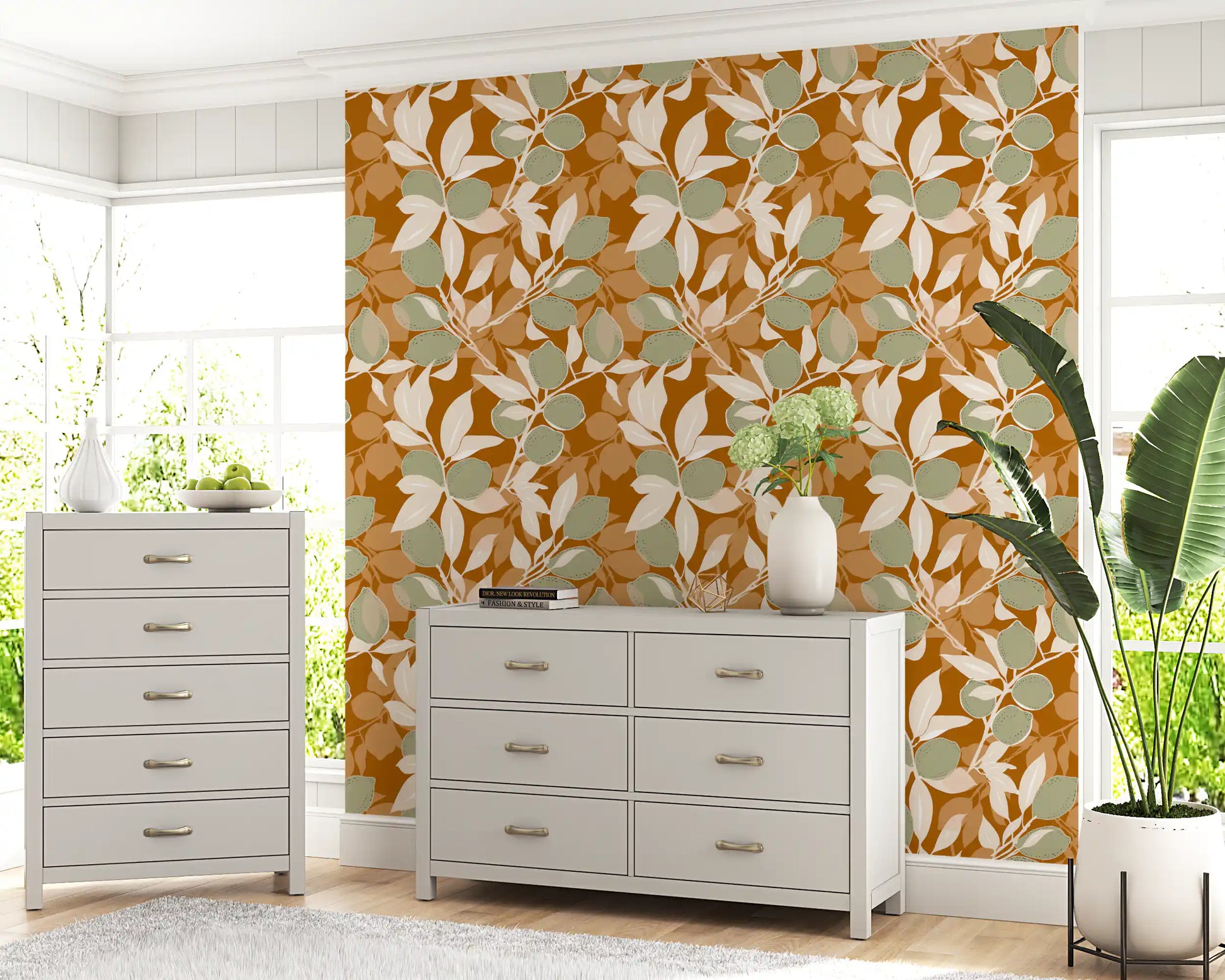 Warm orange backdrop with muted green citrus wallpaper.
