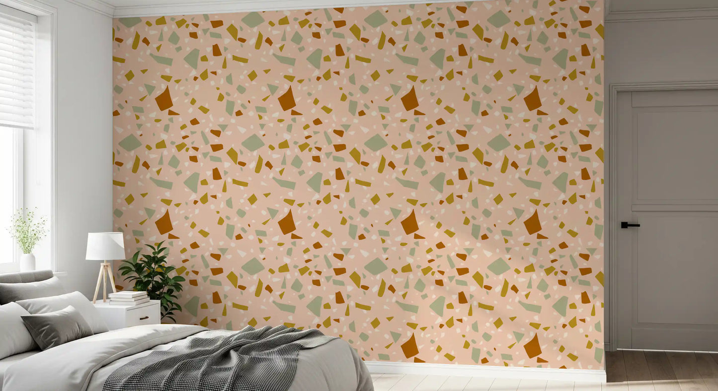 Terrazzo style wallpaper brings soft color to a cozy bedroom