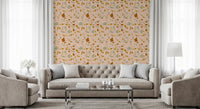 Earthy Sage Terrazzo wallpaper adds character to a modern living room.