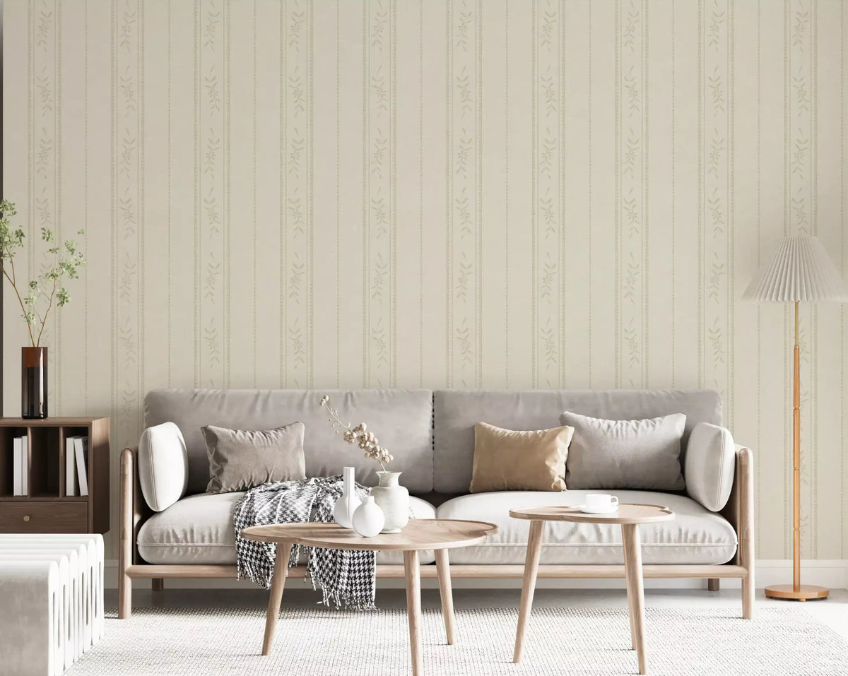 Living room wall covered in cream ivory floral stripe wallpaper beside a white cot and rug., GD9977