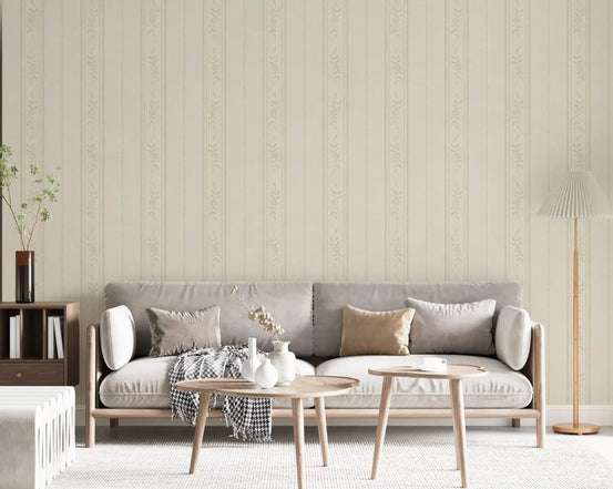 Living room wall covered in cream ivory floral stripe wallpaper beside a white cot and rug., GD9977