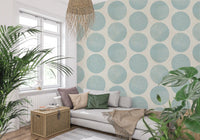 Textured stippling pattern wallpaper within soft blue circular shapes.