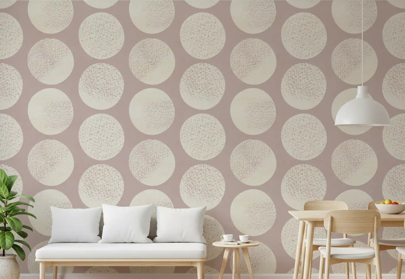 Living room accent wallpaper with geometric circles in cream and dusty rose.