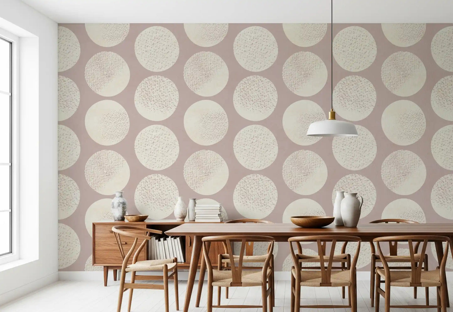 Contemporary circle wallpaper with cream stippling and soft rose undertone.