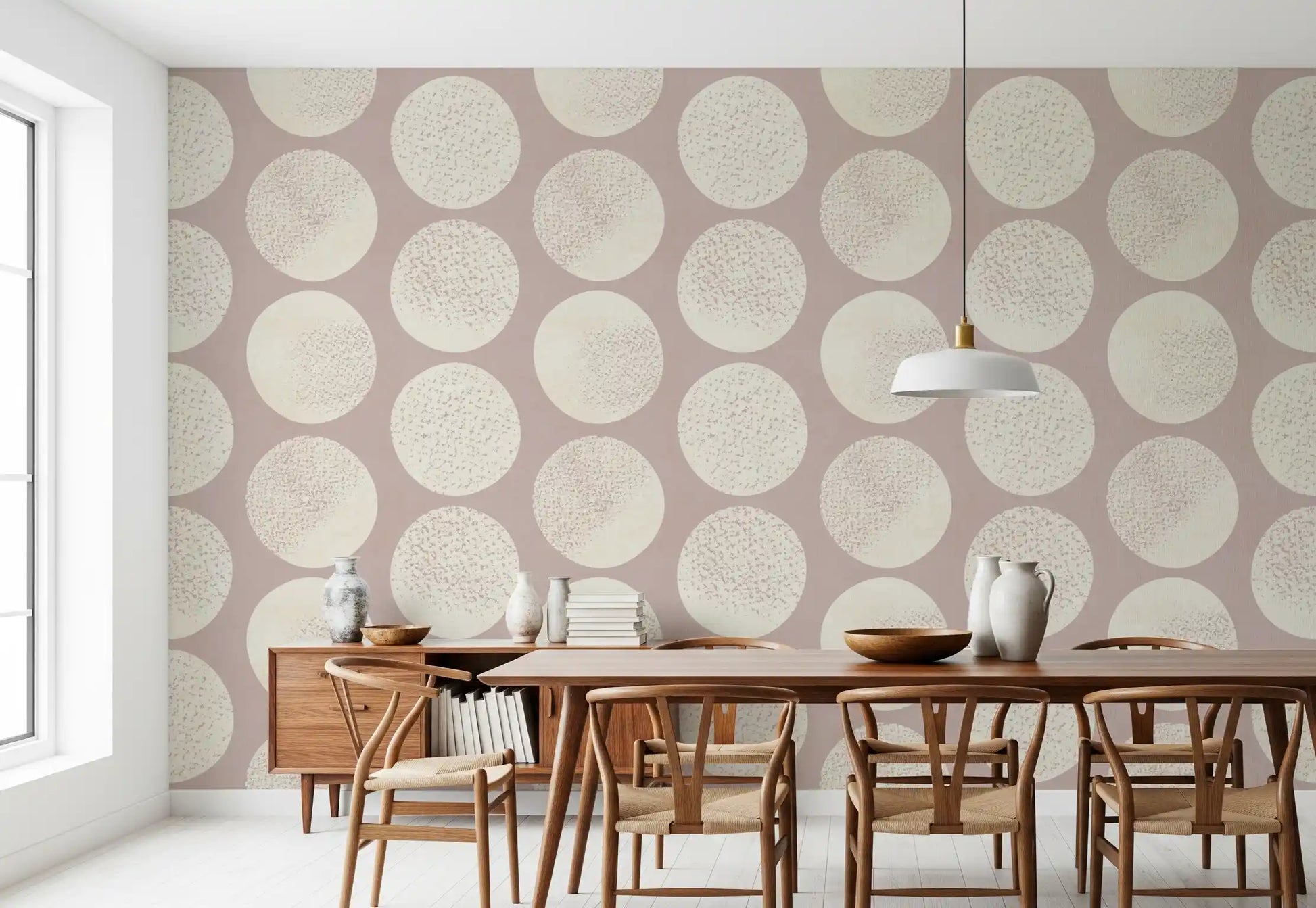 Contemporary circle wallpaper with cream stippling and soft rose undertone.