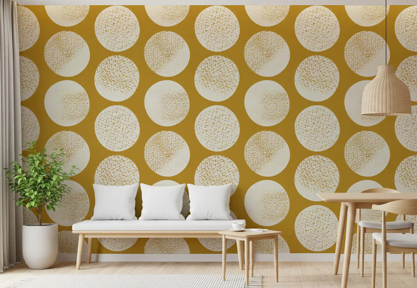 Polka dot wallpaper in cream and gold speckles on mustard background.