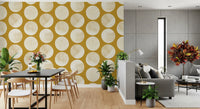 Modern geometric wallpaper showing large circles with organic stippled in dining area. 