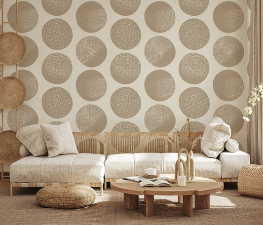 Geometric polka dot wallpaper with large circular motifs and stippled texture in living room.