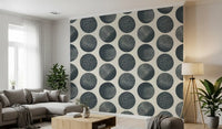Modern wallpaper showing overlapping dark blue circles with organic speckled in living room.