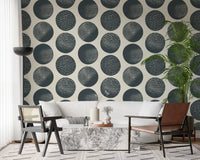 Modern geometric wallpaper with dark blue dotted circles in hallway.