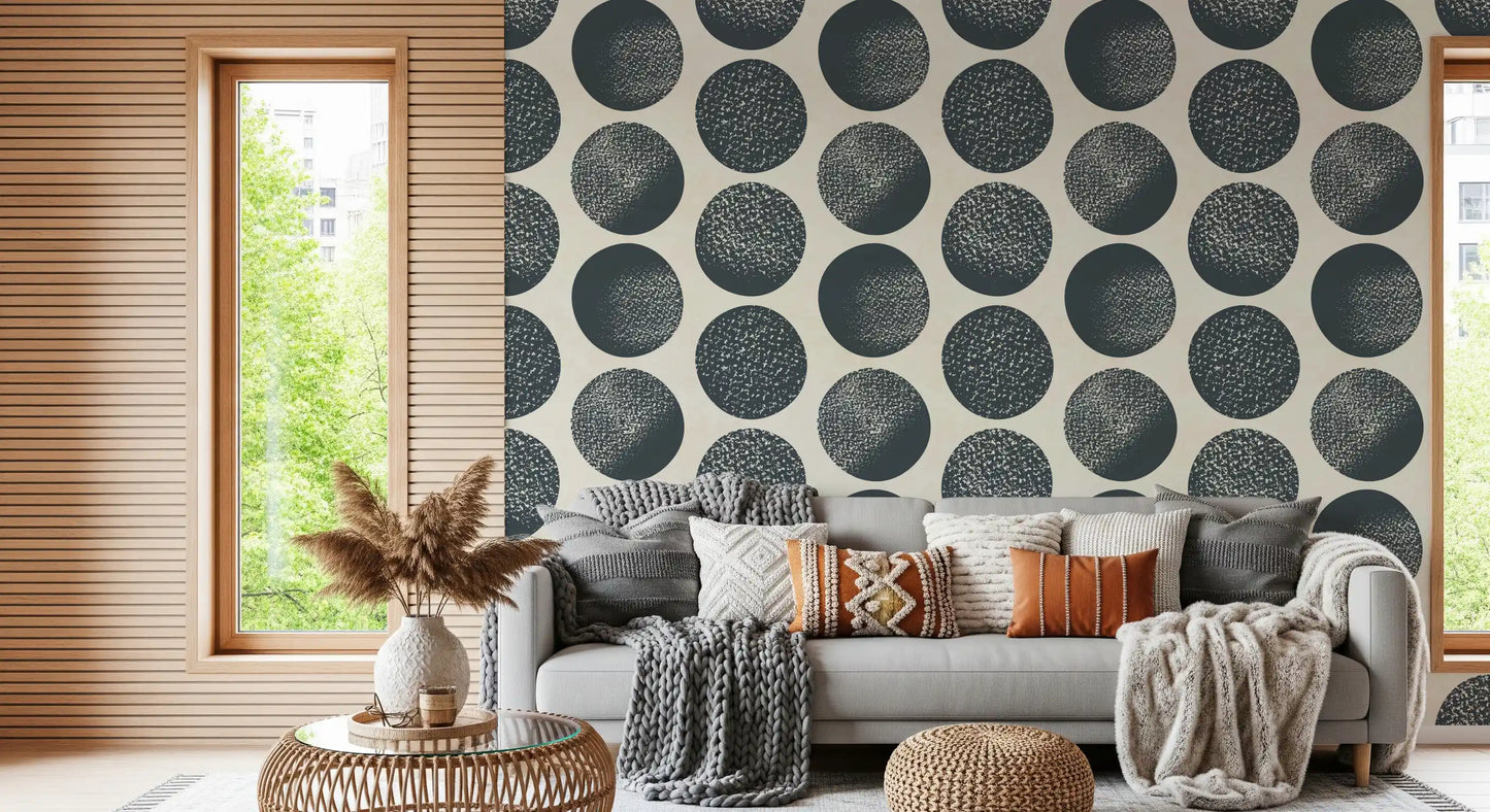 Cream base wallpaper with scattered dark blue spotted circles in a modern geometric arrangement.