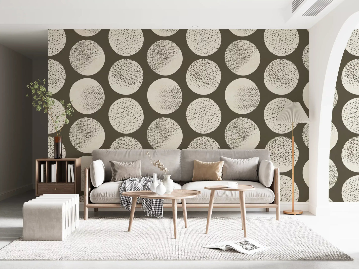 Modern living room wall displaying cream stippled polka dot wallpaper pattern.
