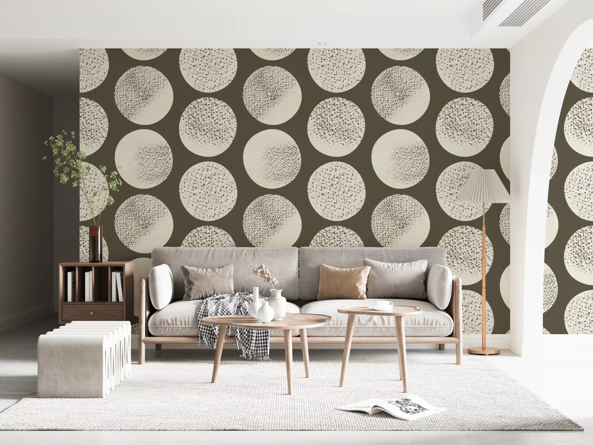 Modern living room wall displaying cream stippled polka dot wallpaper pattern.
