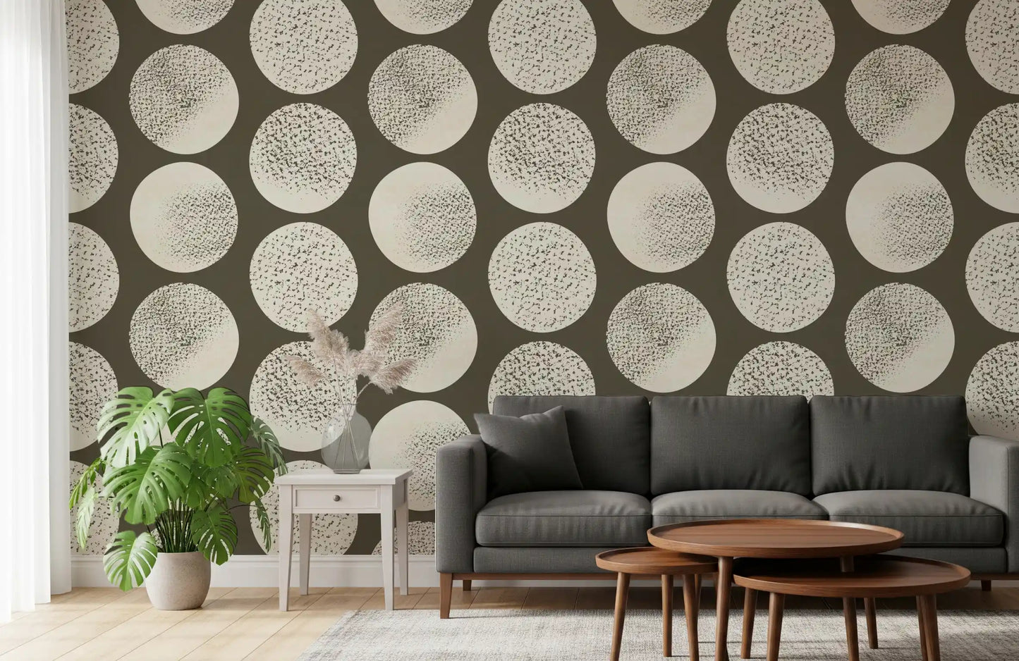 Large cream dots featuring random speckle marks arranged on brown wallpaper.
