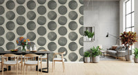 Slate grey stippled polka dot wallpaper with cream background in dining area