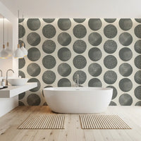  slate grey polka dot wallpaper with organic stipple texture in bathroom.
