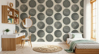 Minimalist polka dot pattern wallpaper in slate grey with organic stipple finish.