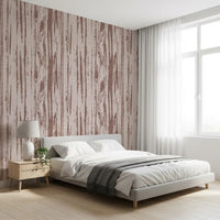 Textured wallpaper featuring distressed woodgrain in dusty rose palette.