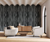 Organic vertical lines creating visual movement across charcoal and grey wallpaper.