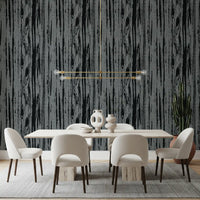 Textured wallpaper with charcoal and cream tones in dining room.