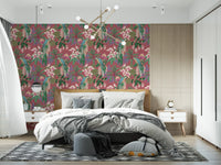 Tropical bird wallpaper with magenta protea and dusty pink background in bedroom.