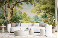 Painted nature scene with flowing river and leafy trees wall mural.