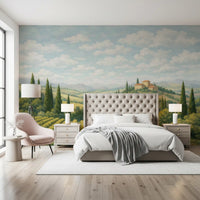 Countryside vineyard mural featuring a winding pathway and cloudy sky in bedroom.