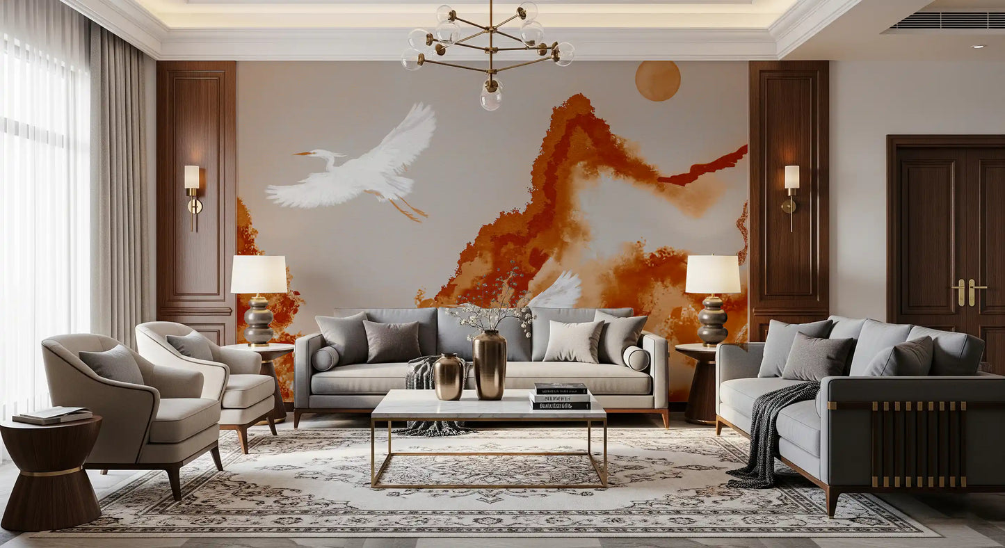 Ochre toned mountain mural with flying cranes and pale sun in cream sky.