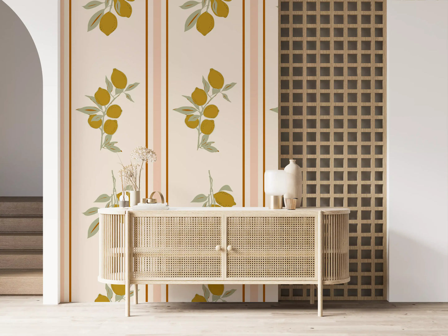 Lower lemon cluster of the wallpaper showing four fruits hanging from a branched stem in mellow ochre tones.