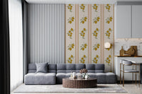 Living room with a linen chair and brass floor lamp standing beside lemon branch wallpaper.