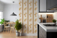 Botanical citrus wallpaper with olive foliage and warm rust borders in kitchen.