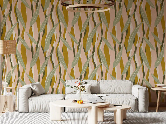 Mustard olive leaf stripe wallpaper in a living room setting with warm boho character.
