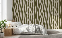 Scandinavian boho stripe wallpaper featuring irregular sage green waves over warm neutral cream.