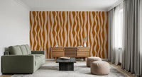 Retro boho wavy stripe pattern wallpaper in terracotta brown and soft blush pink shades.