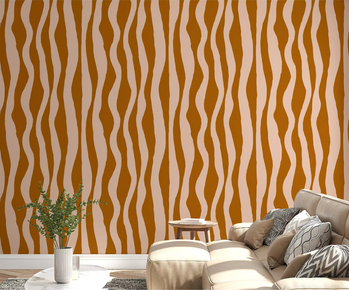 Living room wall covered in Terracotta Pink Wavy Stripe Wallpaper with boho character, GD10051