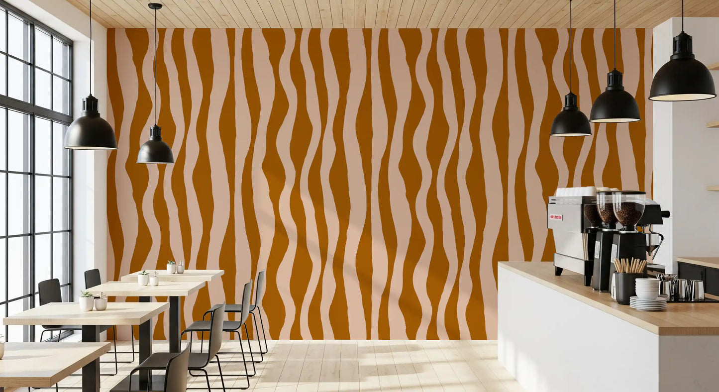 Cafe interior wall dressed in retro boho wavy stripe wallpaper design.