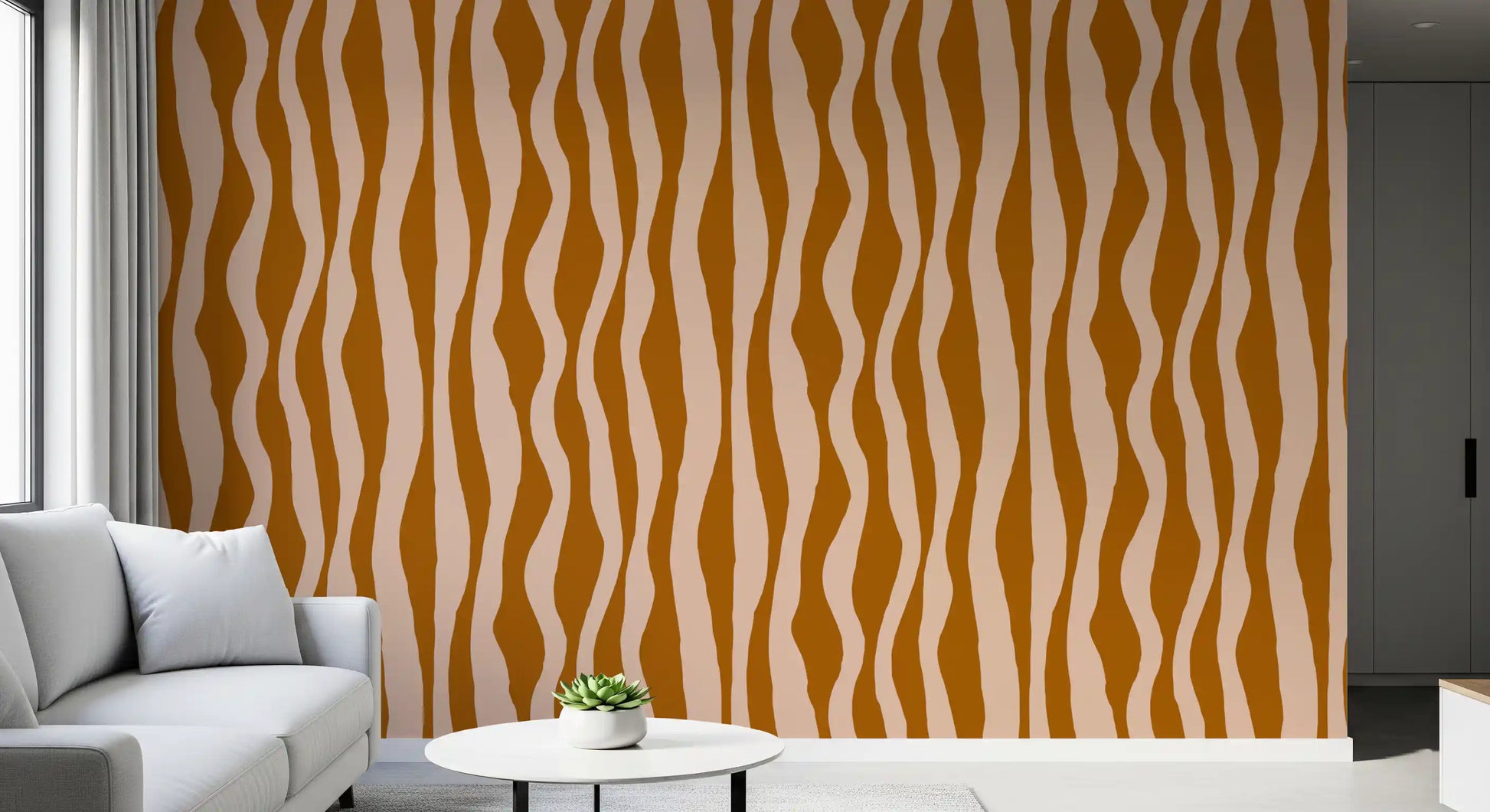 Living area wall decorated with organic wave pattern wallpaper in earthy boho tones.